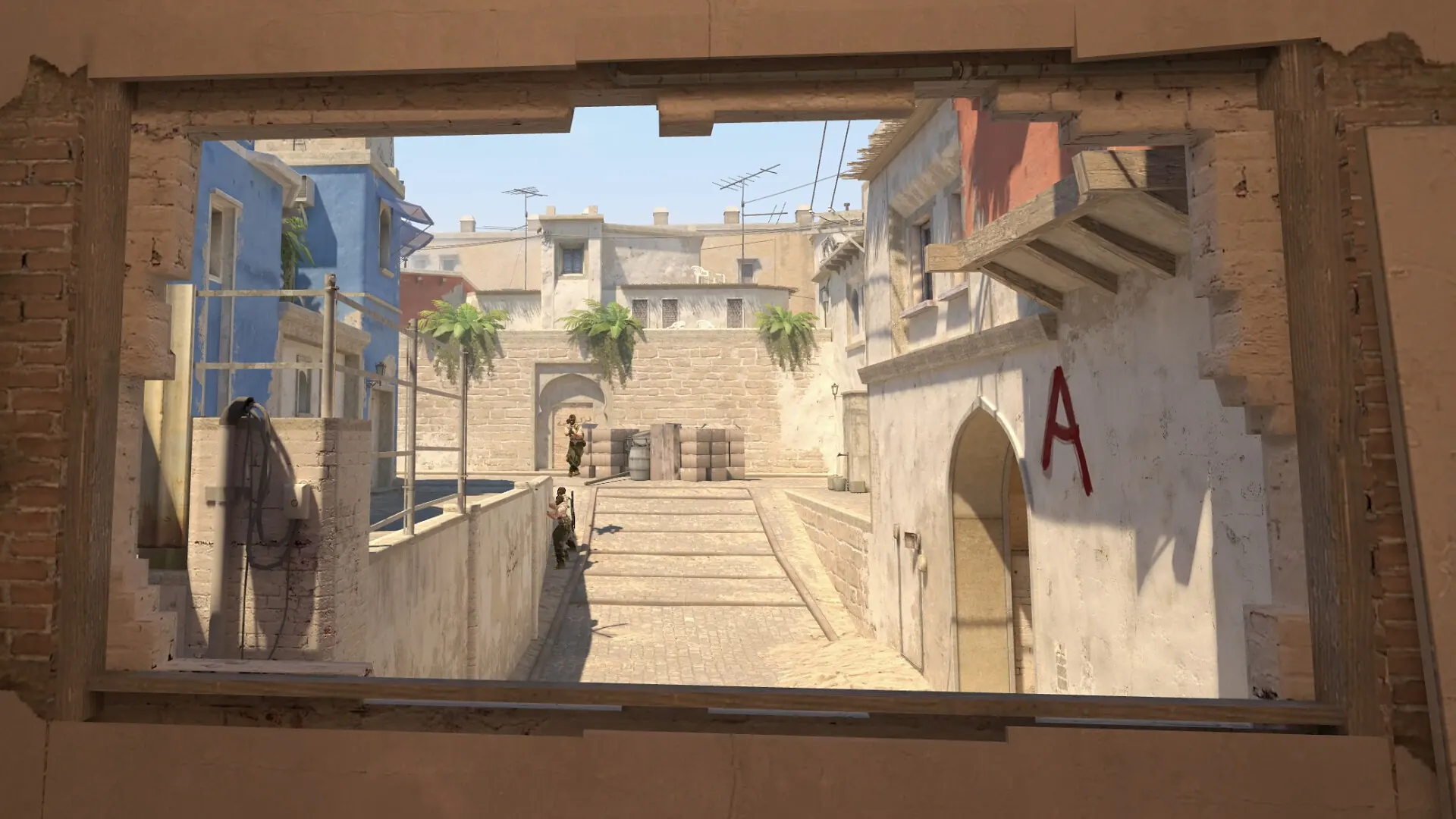 Official CS2 store screenshot showing map geometry and an A-site approach through a broken wall